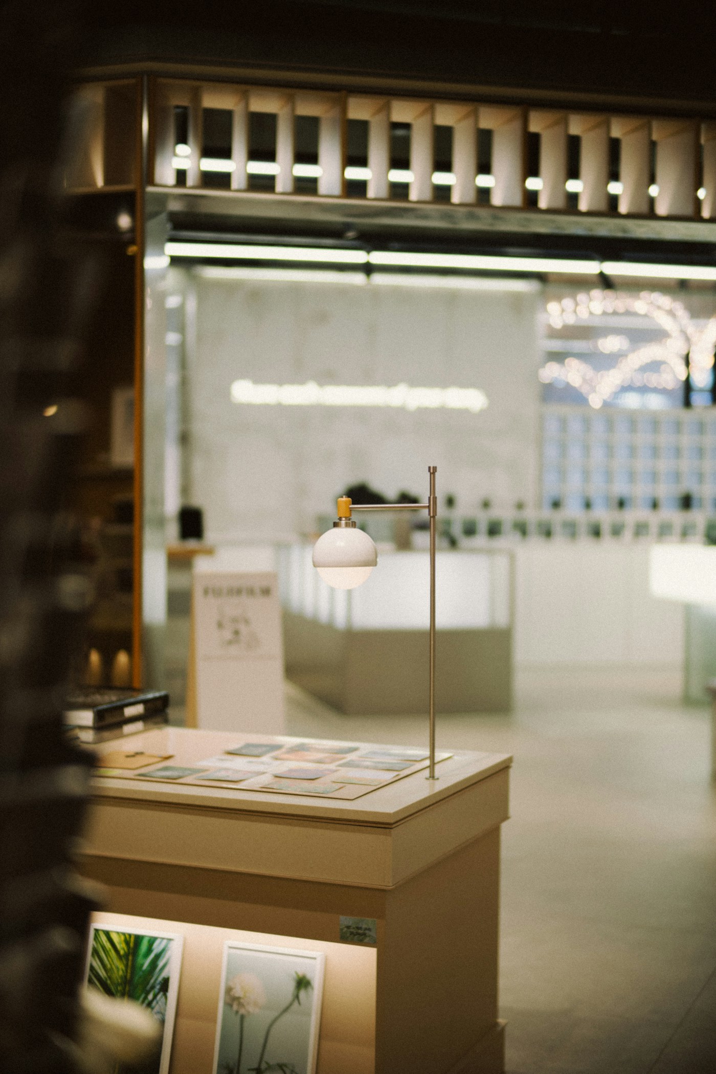 A modern retail display with sculptural lighting